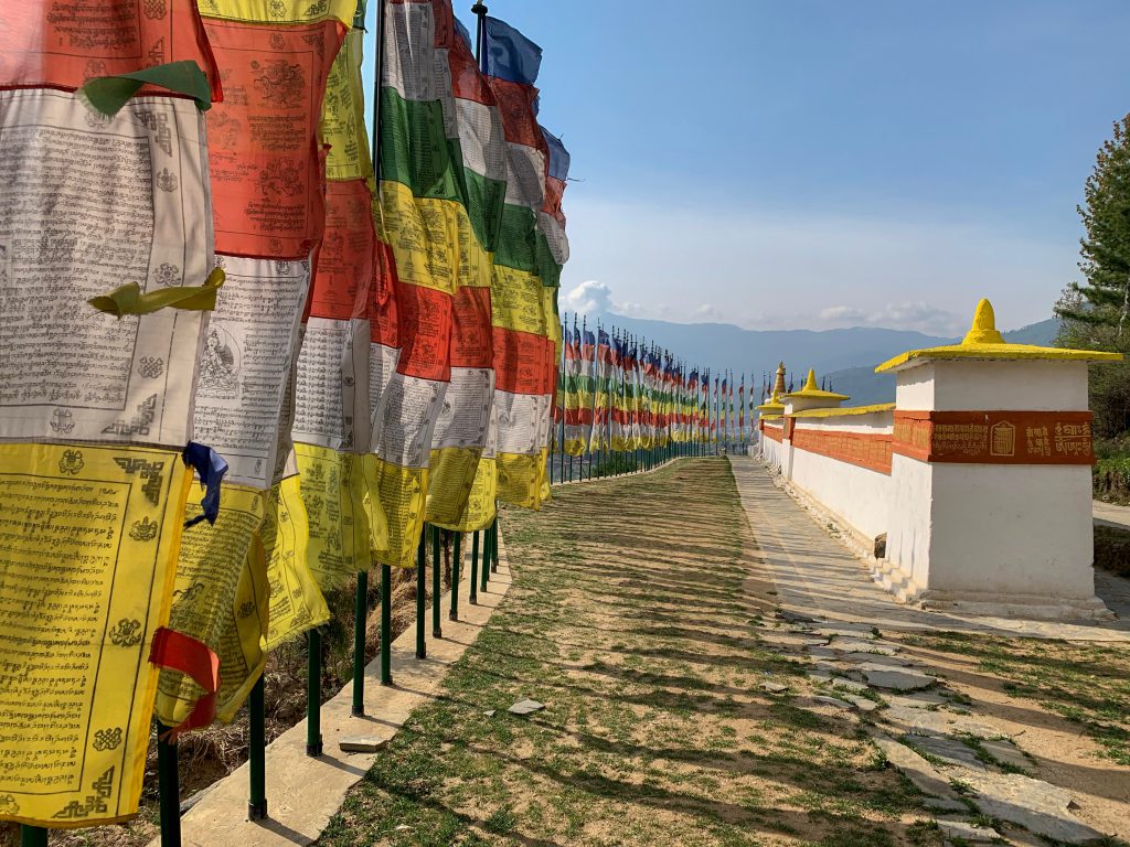 Prayer flags and stupa at Dechenphodrang Monastry in Thimphu, Bhutan