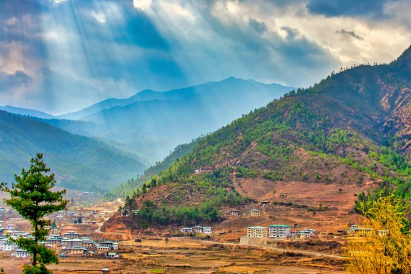 Sunbeams over the hills of the Thimpu District, Bhutan